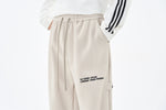 Cream Embroidered Jogger Pants Side view | Weezy
