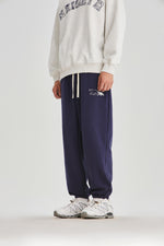 Navy Blue Embroidered Sweatpants Side view | Weezy