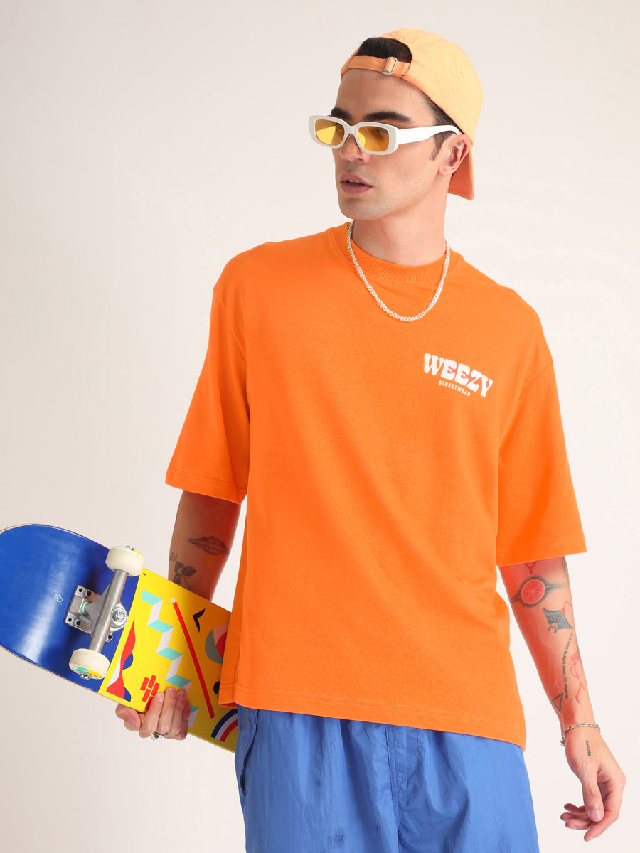 Neon Orange Change Is Constant Oversized T-Shirt Side view | Weezy