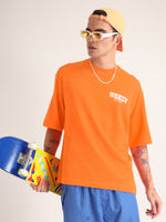 Neon Orange Change Is Constant Oversized T-Shirt Side view | Weezy