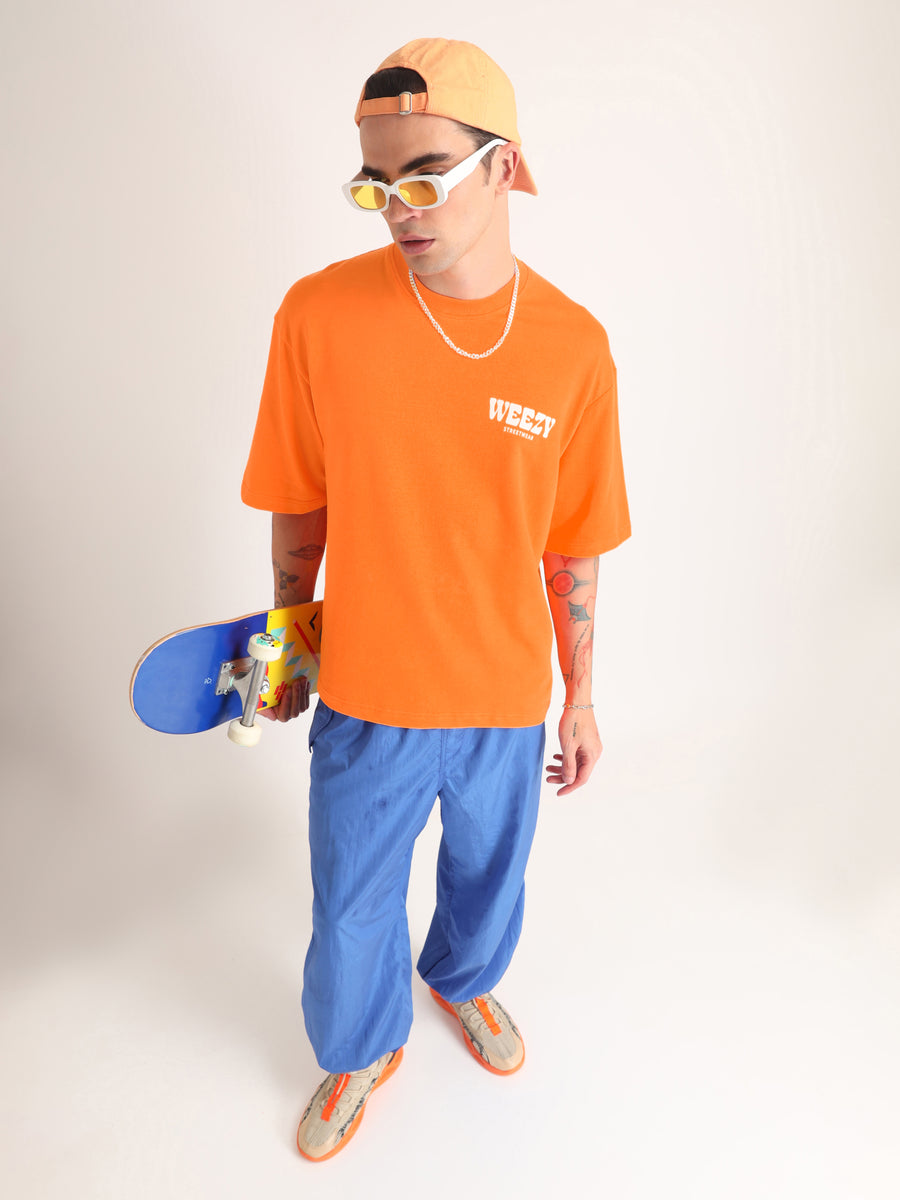 Neon Orange Change Is Constant Oversized T-Shirt Lifestyle view | Weezy