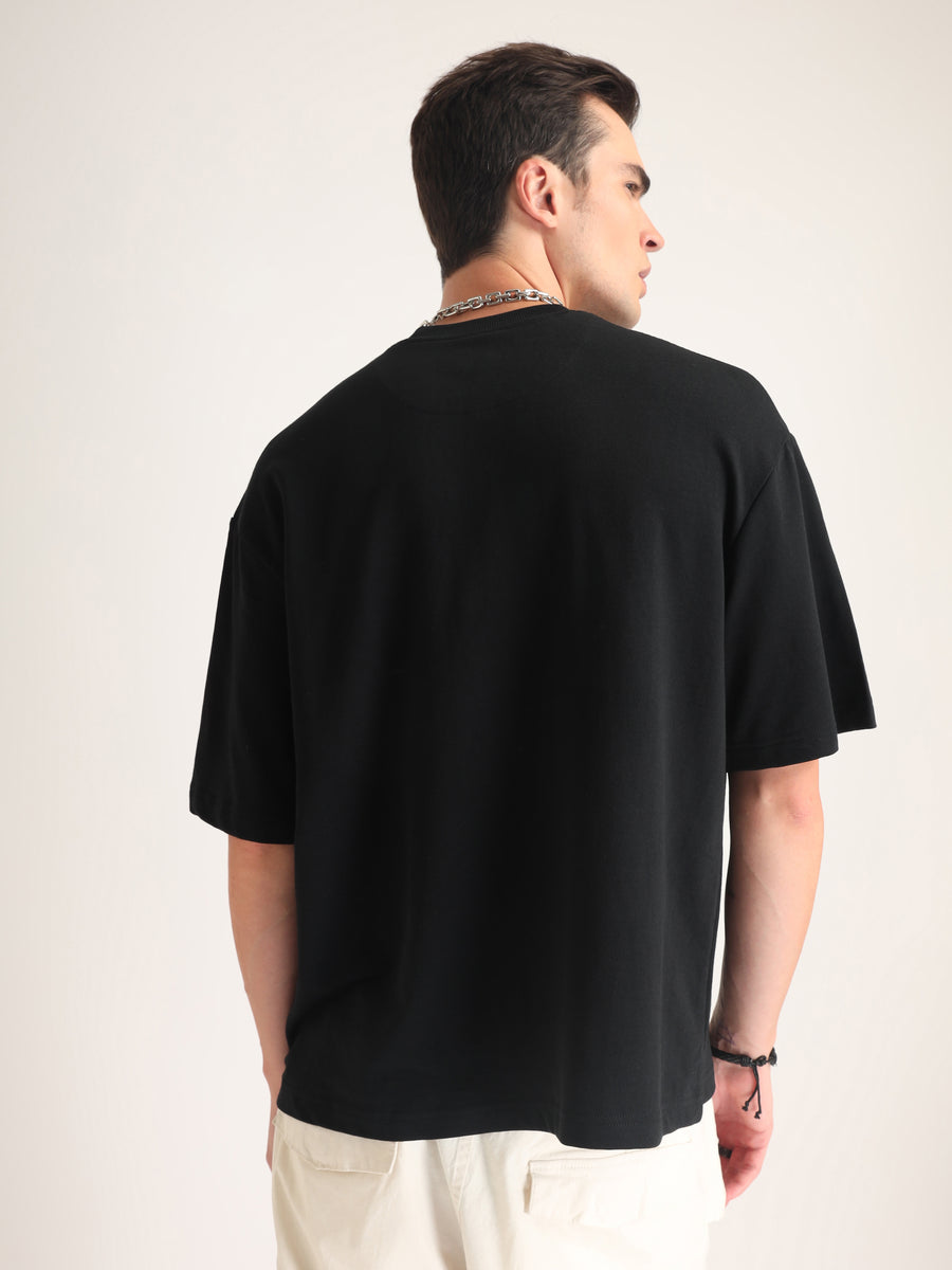 Jet Black Evolve Oversized T-Shirt Flat lay | Weezy