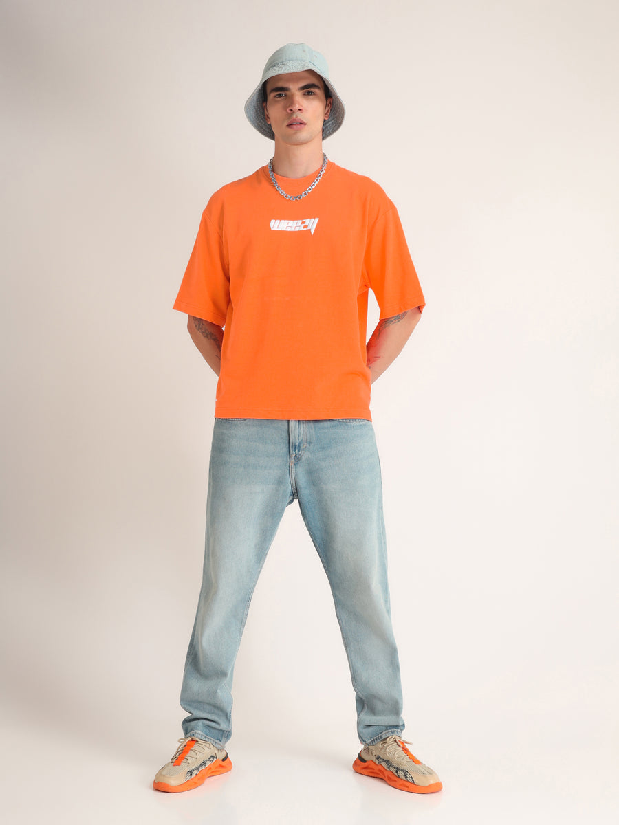 Neon Orange Slashing Reality Oversized T-Shirt Lifestyle view | Weezy