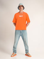 Neon Orange Slashing Reality Oversized T-Shirt Lifestyle view | Weezy