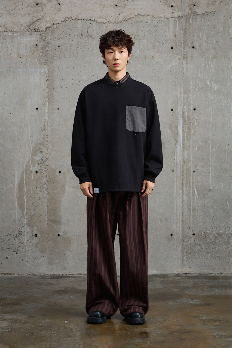 Black Crewneck Sweatshirt With Pocket Detail Lifestyle view | Weezy