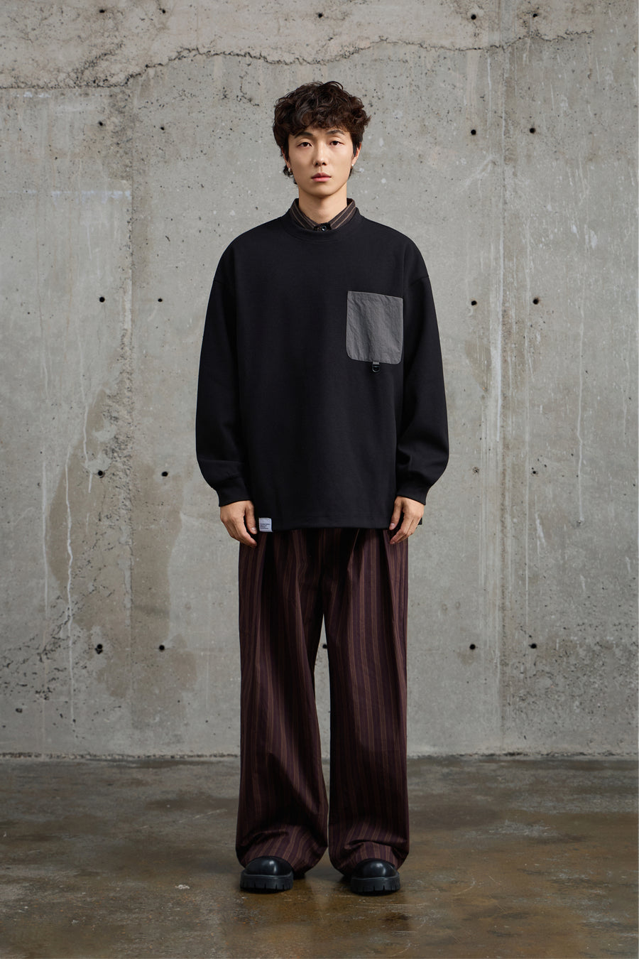 Black Crewneck Sweatshirt With Pocket Detail Lifestyle view | Weezy