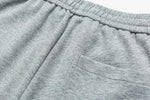 Embroidered Grey Sweatpants Close-up | Weezy