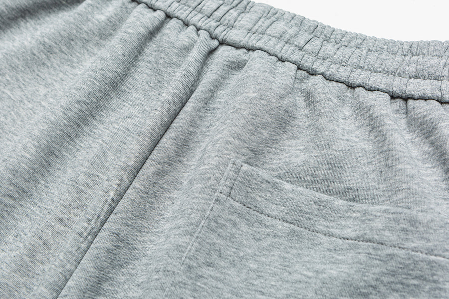 Embroidered Grey Sweatpants Close-up | Weezy