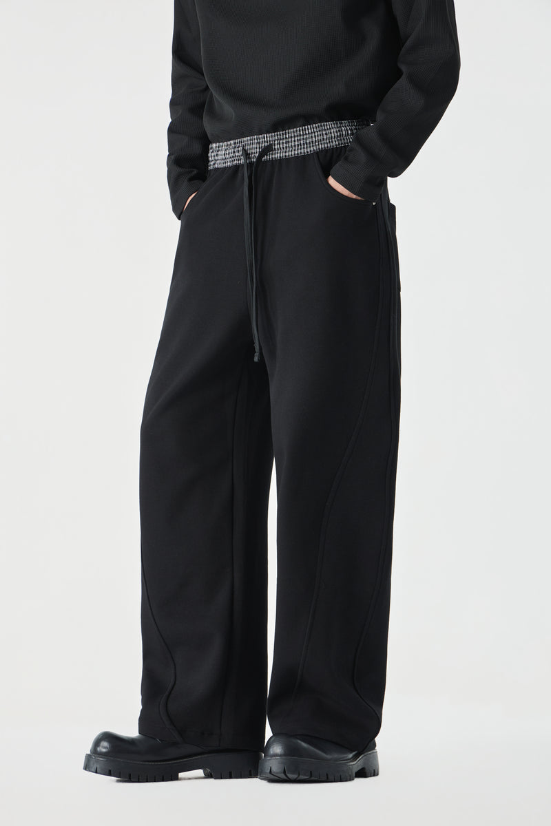 Noir Parallel Pants Close-up | Weezy
