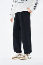 Embroidered Black Sweatpants Detail view | Weezy