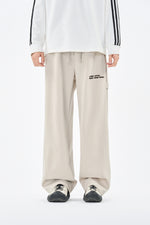 Cream Embroidered Jogger Pants Lifestyle view | Weezy
