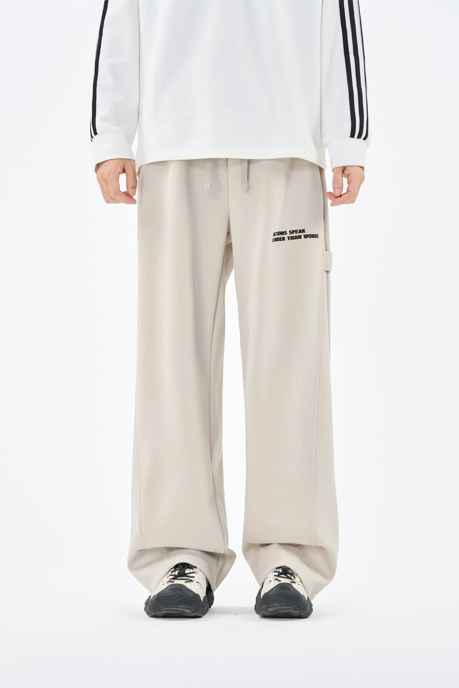 Cream Embroidered Jogger Pants Lifestyle view | Weezy