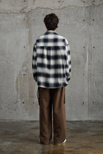 Black & White Plaid Flannel Overshirt Side view | Weezy