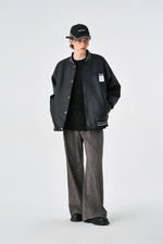 Black Retro Rewind Leather Varsity Jacket Lifestyle view | Weezy