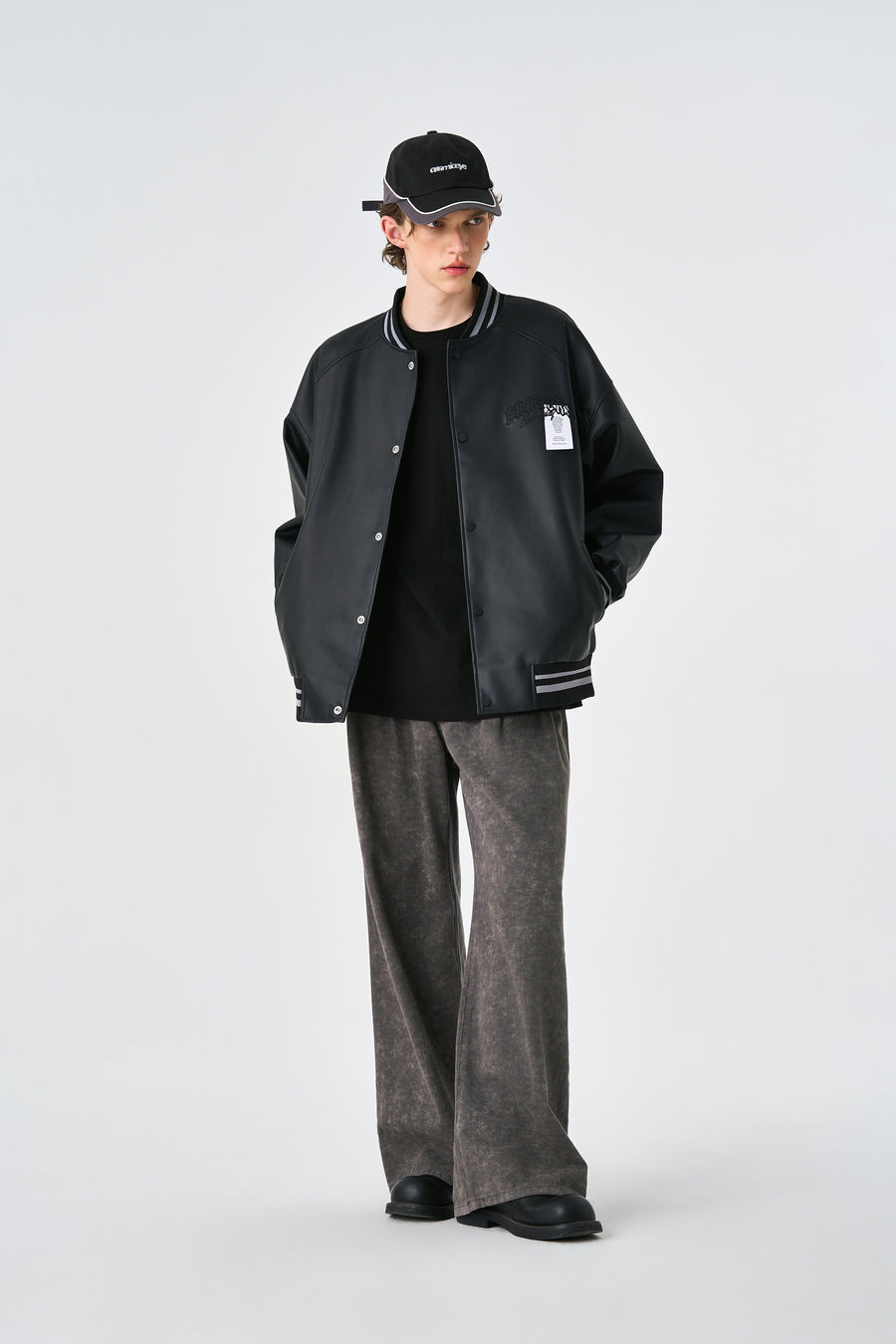 Black Retro Rewind Leather Varsity Jacket Lifestyle view | Weezy
