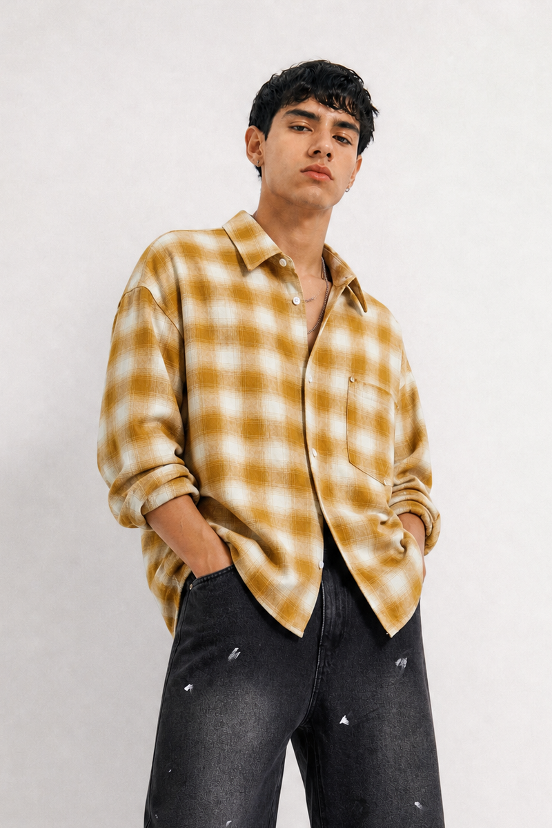 Man in checked overshirt and dark jeans — shop Weezy shirts and overshirts for men