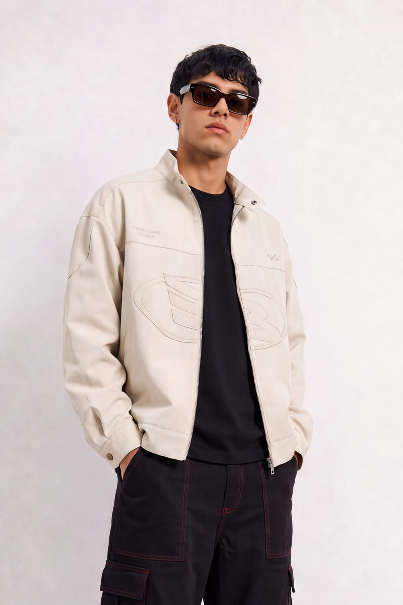 Man in cream utility jacket over black tee — shop Weezy jackets for men