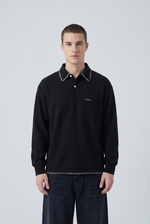 Noir Crest Polo Shirt Front view | Weezy