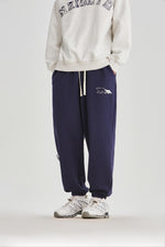 Navy Blue Embroidered Sweatpants Flat lay | Weezy