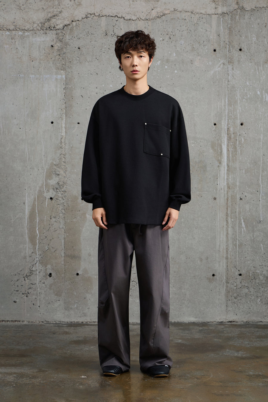 Unisex Black Pullover With Button Accents Detail view | Weezy