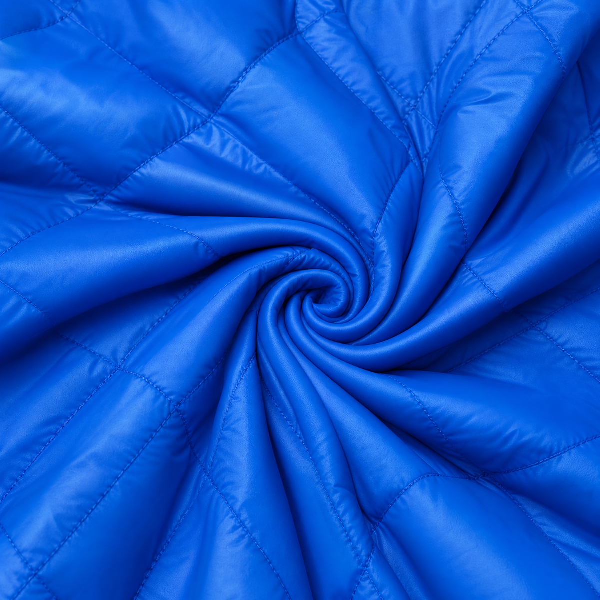 Close up of the fabric of this Electric Blue Quilted Puffer Jacket