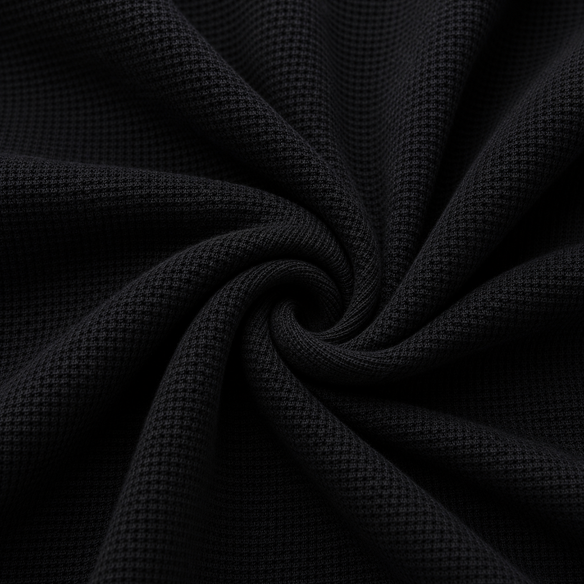 Close up of the fabric of this Jet Black Waffle Knit Collared Polo