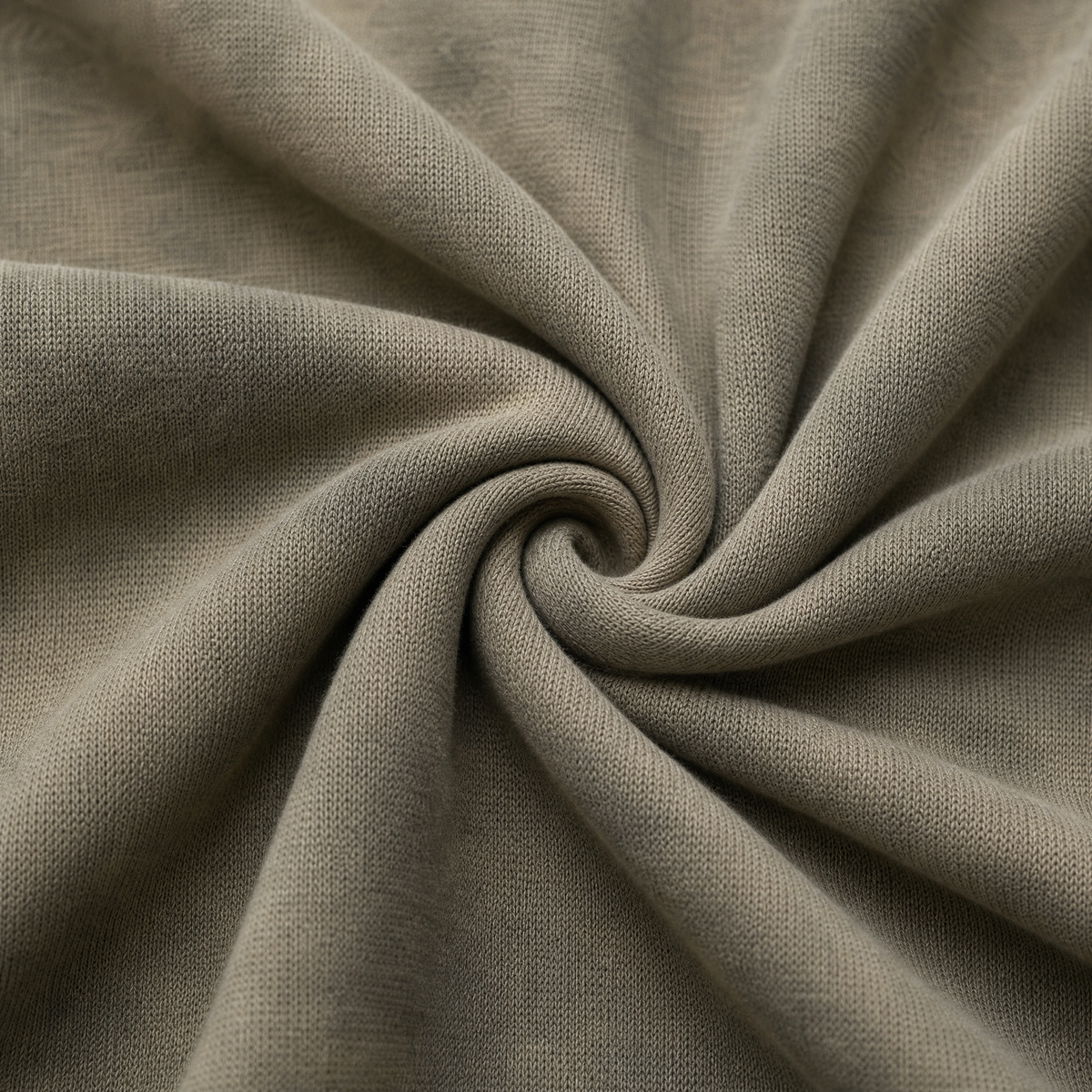 Close up of the fabric of this Light Green Bleached Crewneck Sweatshirt