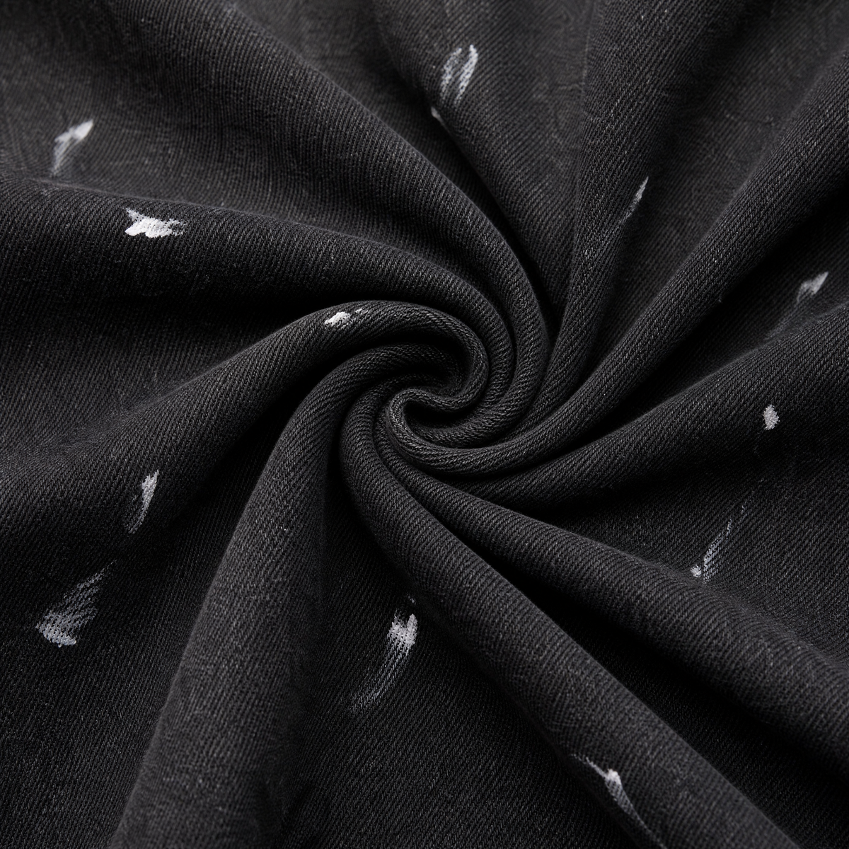 Close up of the fabric of this Monochrome Stroke Painted Baggy Fit Jeans